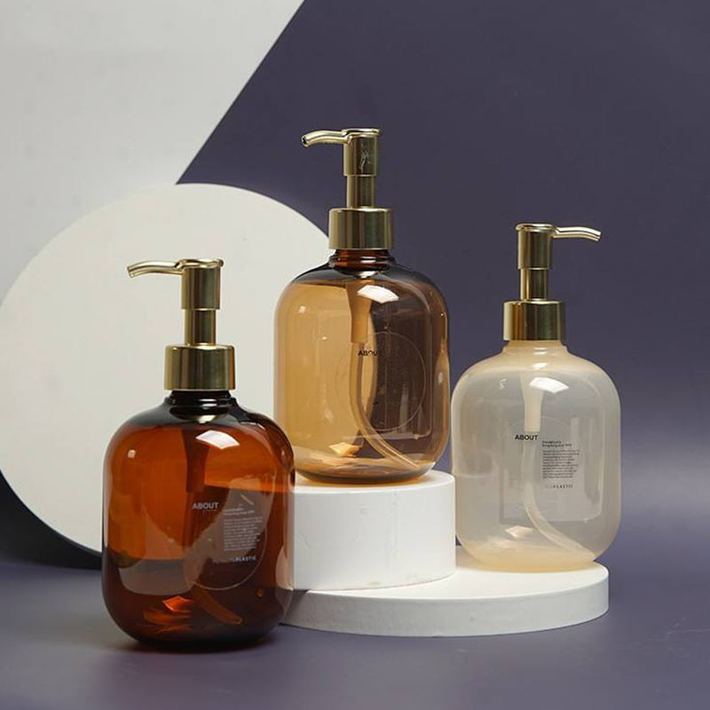 300 ml 500 ml PET plastična jantarna okrugla prazna bočica regeneratora za losion za tijelo Zlatna bočica za šampon s pumpicom za PET losion