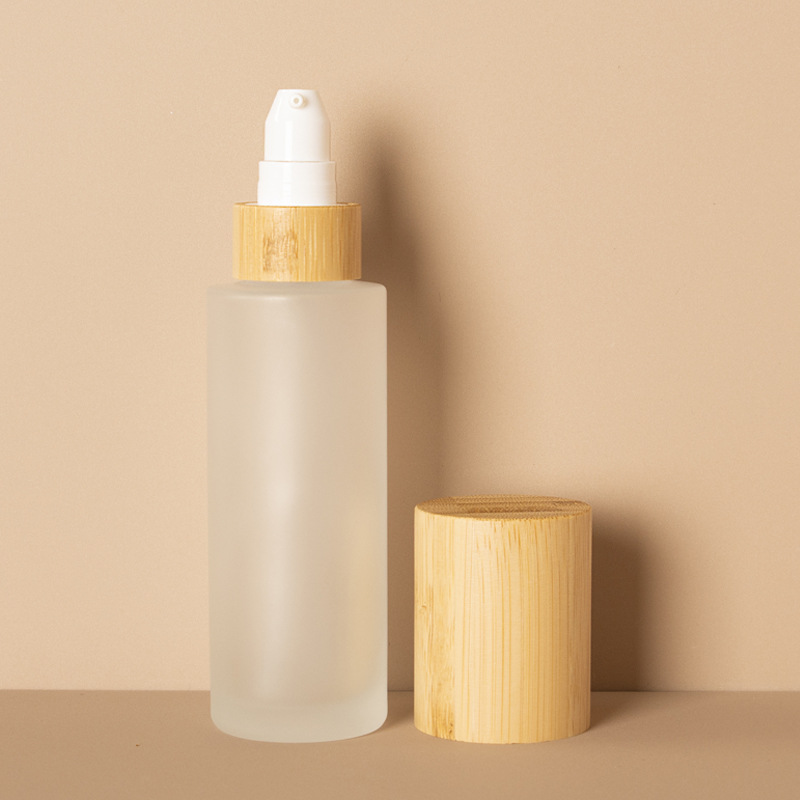 Staklena bočica s raspršivačem od matirane kozmetičke pumpice za finu maglicu i losion s poklopcem od bambusa Staklena bočica s raspršivačem od matirane kozmetičke pumpice za finu maglicu i losion s poklopcem od bambusa