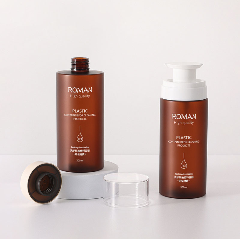 Plastične boce s pumpicom za doziranje otporne na curenje Veliki prazan prozirni cilindar boje jantara koji se može ponovno puniti za šampon, regenerator za kosu, losion, ulja